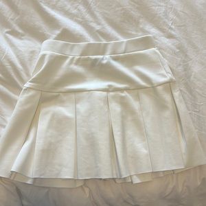 white mini pleated skirt